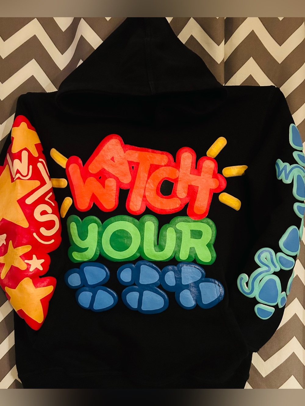 Black Hoodie with Colorful 'Watch Your Step' Graffiti Print
